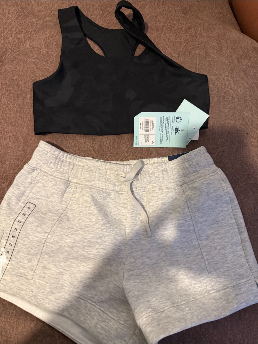 Girls small black bra and Xs/s gray shorts